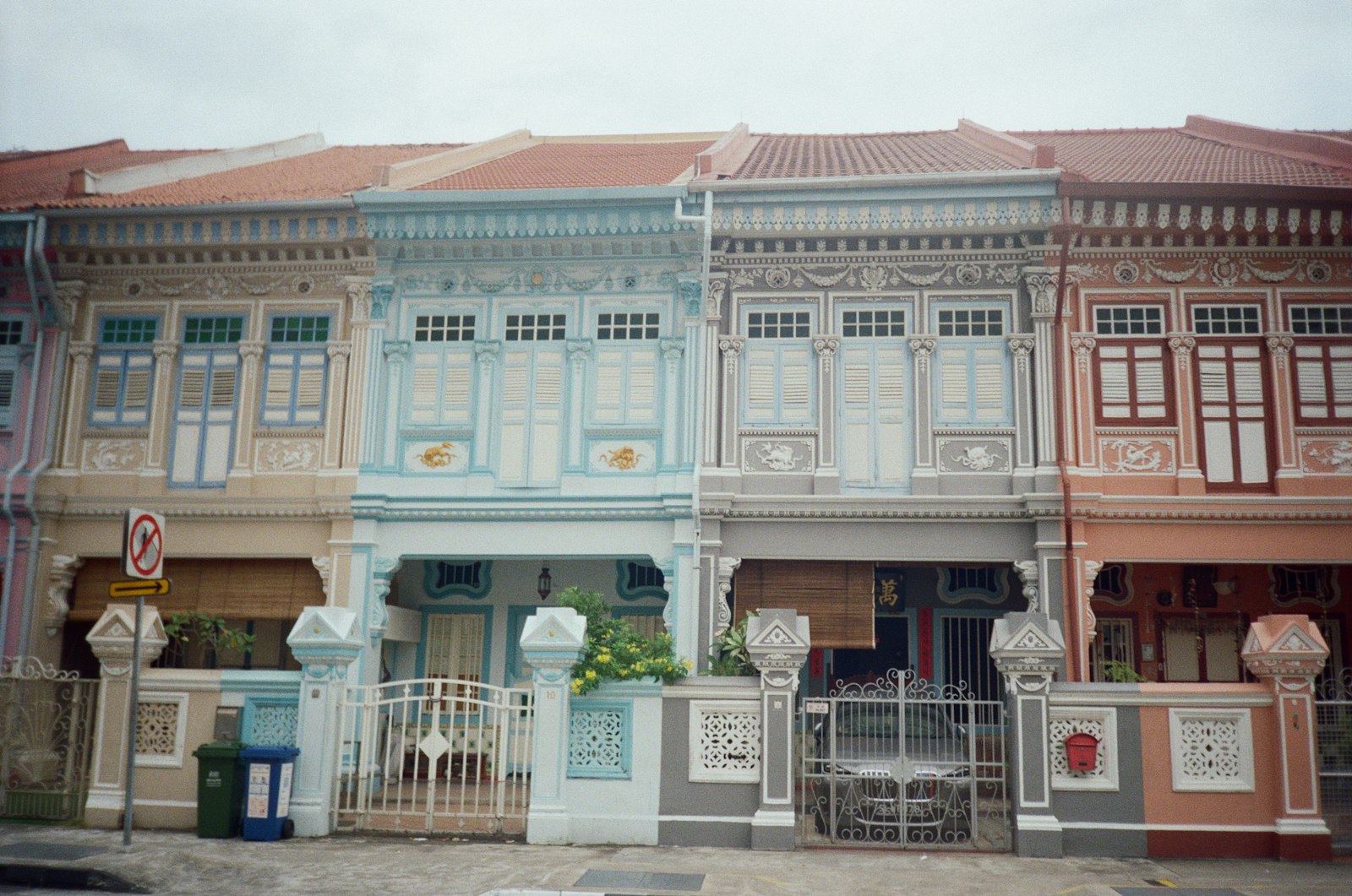 Row of colourful Peranakan shophouses with ornate facades on Joo Chiat Road
